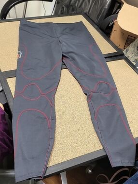 The North Face GreyBlack Leggings with Maroon Contrast Stitching and Orange Logo